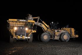 Birdsboro Quarry: A Caterpillar 992K loads a Caterpillar 777G with shot rock in the early morning hours.